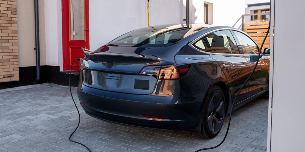 black-electric-car-is-being-charged-at-station-2021-10-13-02-10-53-utc-1_Light